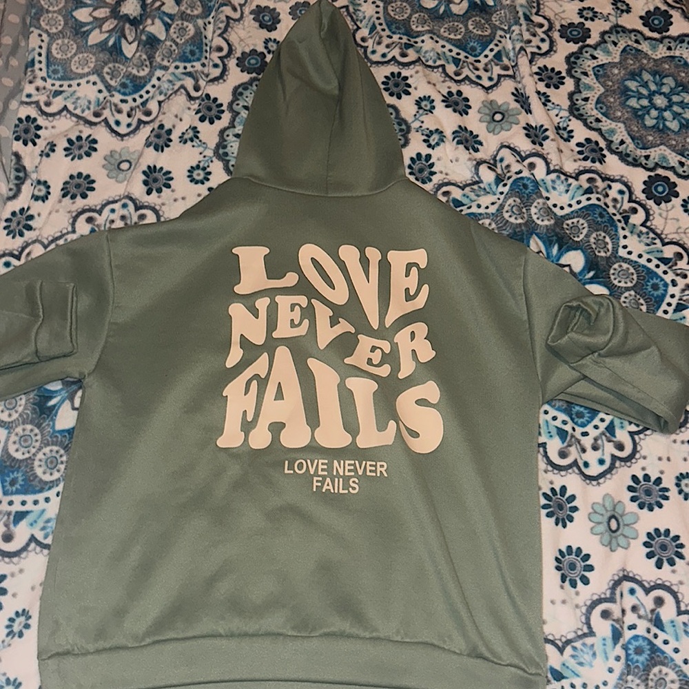 Green Hoodie “ Love Never Fails “